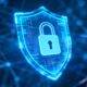 Digital shield with lock icon, abstract network background.